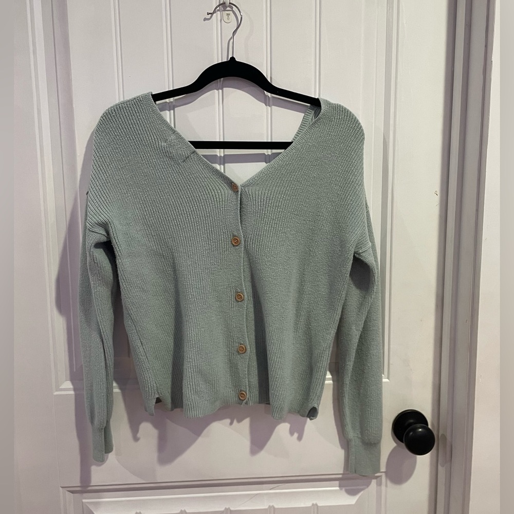 Hippie Rose light blue sweater with buttons up the front. Great condition!